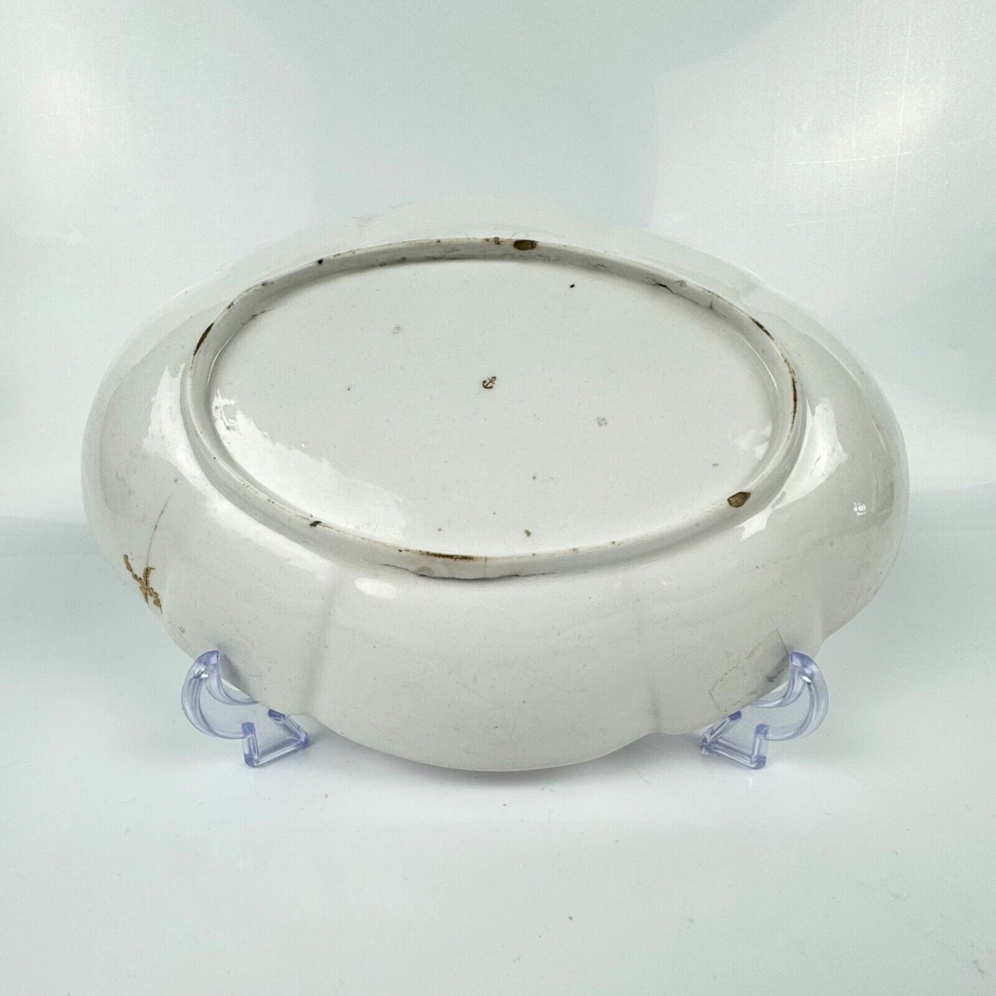 A Chelsea lobed dish painted with an urn and neo classical decoration. c.1760