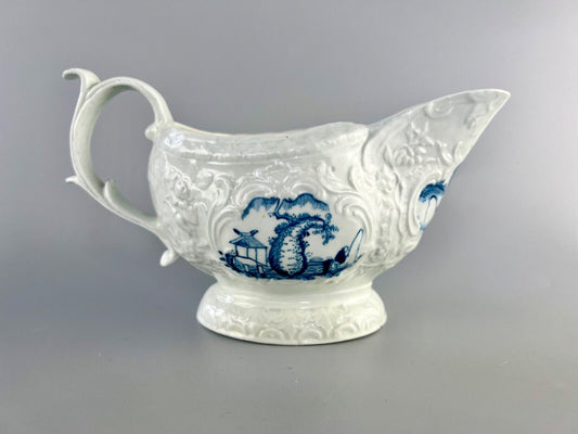 A Worcester porcelain 'Two Porters Landcsape v.1' pattern sauceboat c1770