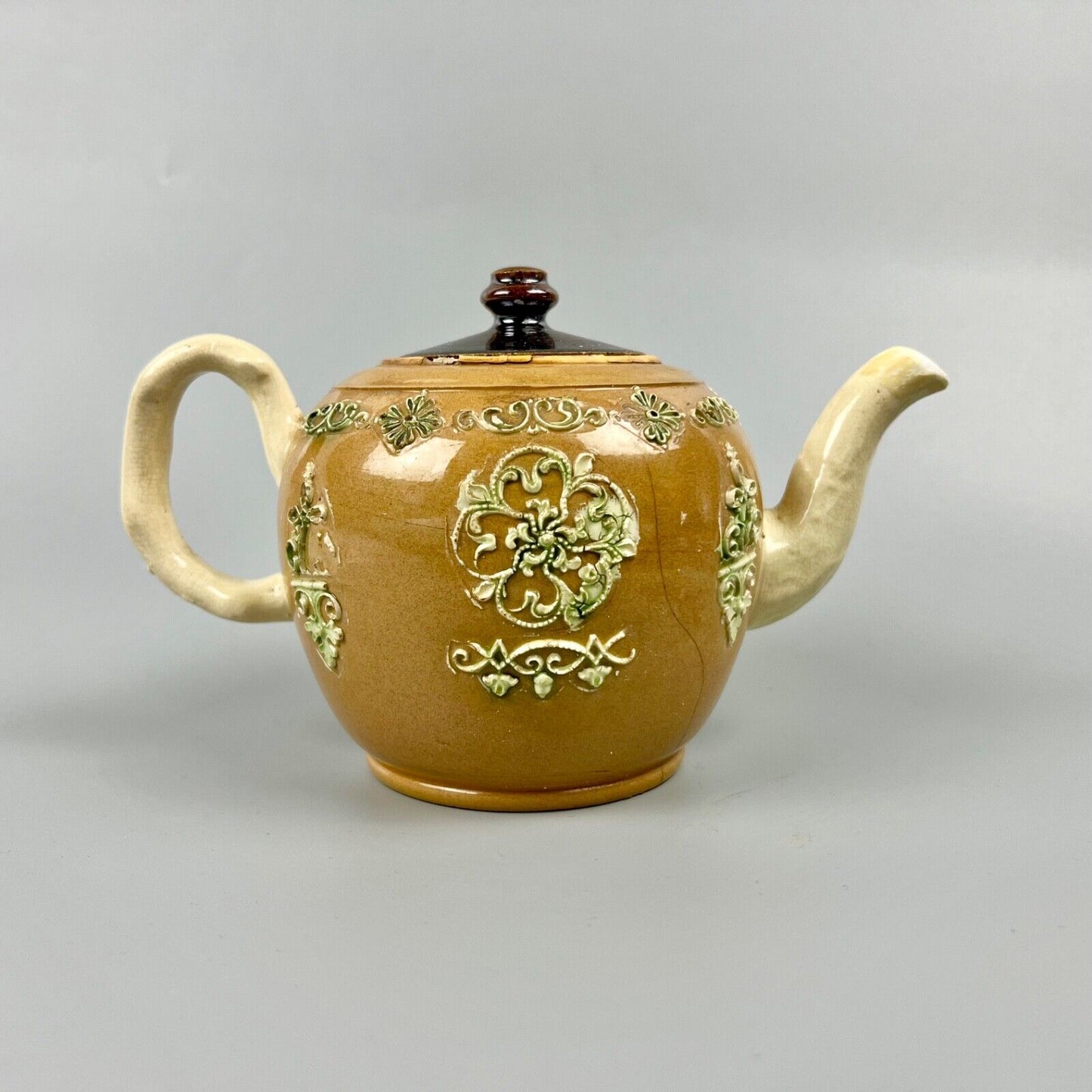 Whieldon-style Staffordshire sprigged teapot and associated cover c.1745-50