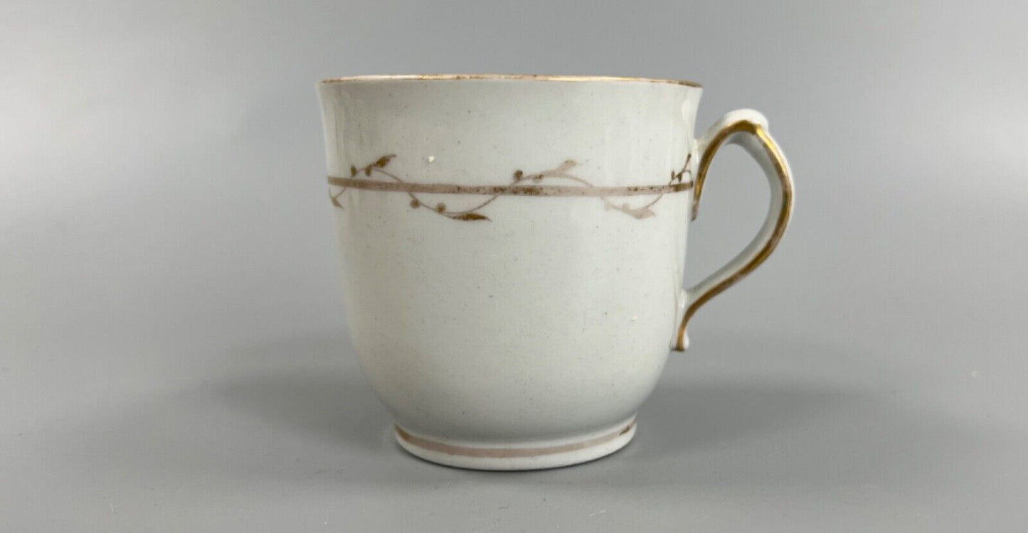 A c.1787-95 New Hall clip handle cup and saucer in pattern number 170