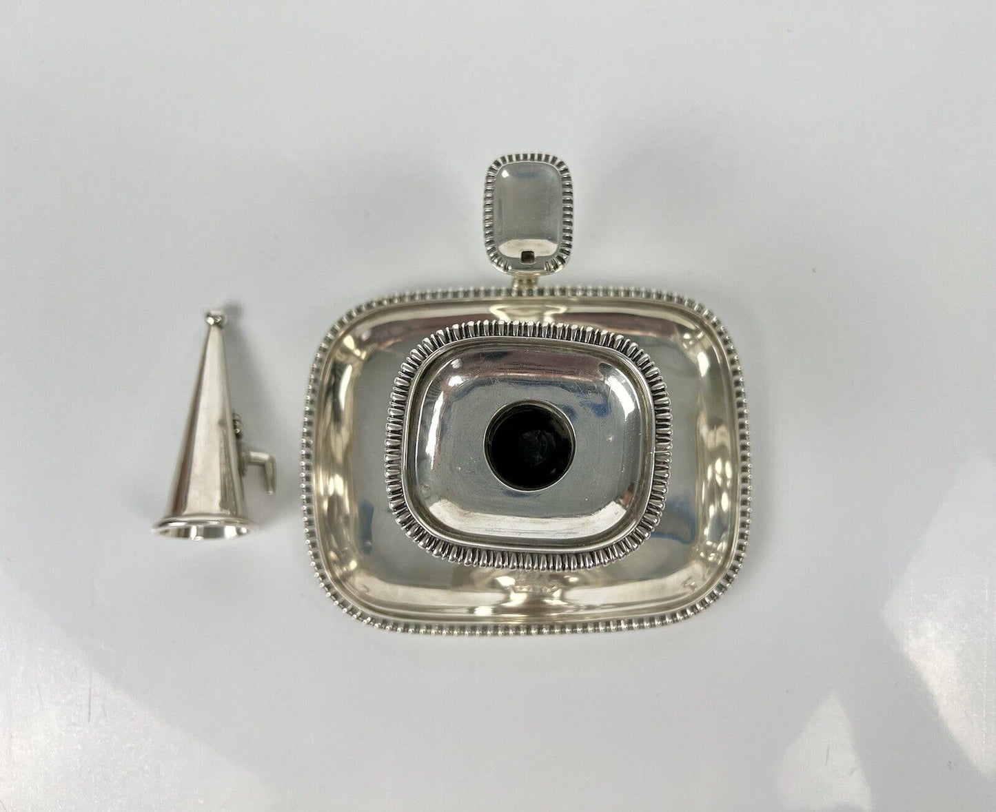 A fine Thomas Bradbury And Son silver chamberstick. London 1913.