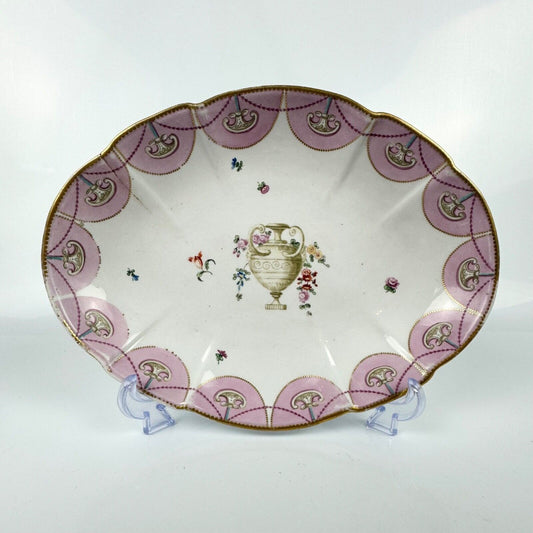 A Chelsea lobed dish painted with an urn and neo classical decoration. c.1760