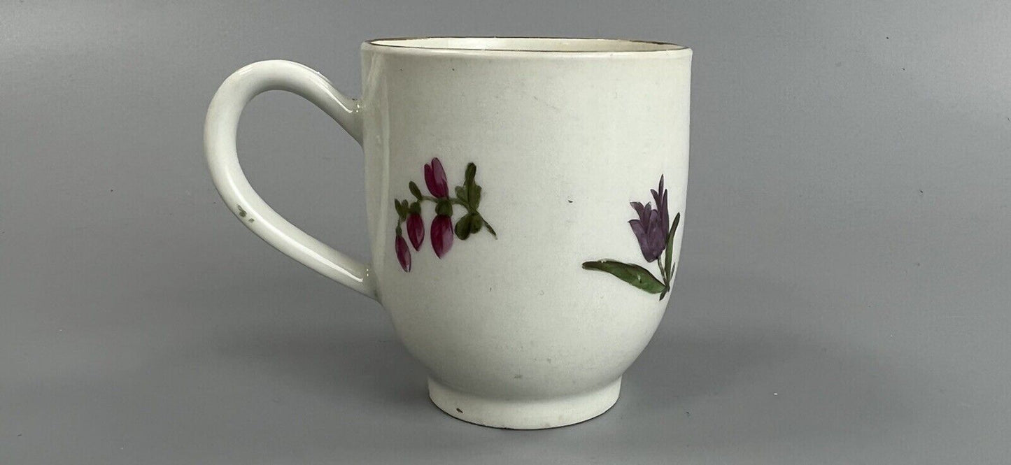 A late 18thc Worcester polychrome coffee cup well painted with floral sprays #5