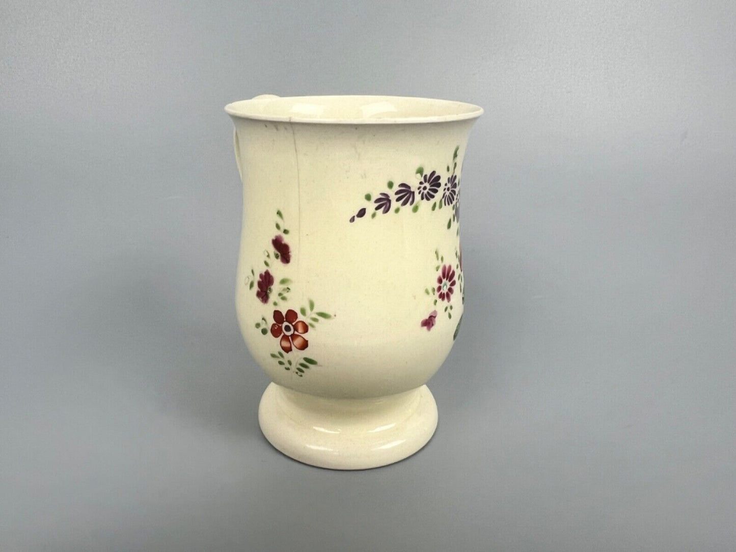 A rare Cockpit Hill Derby floral-painted creamware mug c.1770-5. Ex-Tom Wallford