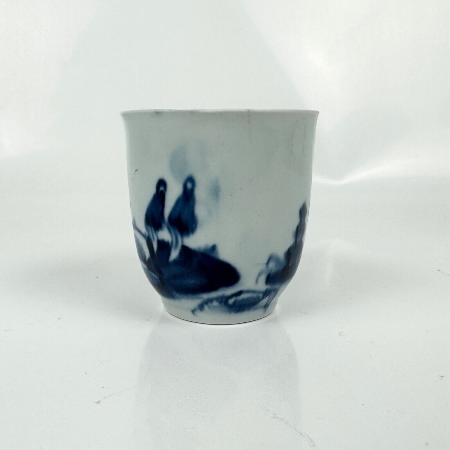 A Liverpool (Chaffers) coffee cup in the "Two Chinamen Bowing" pattern. c.1760-5