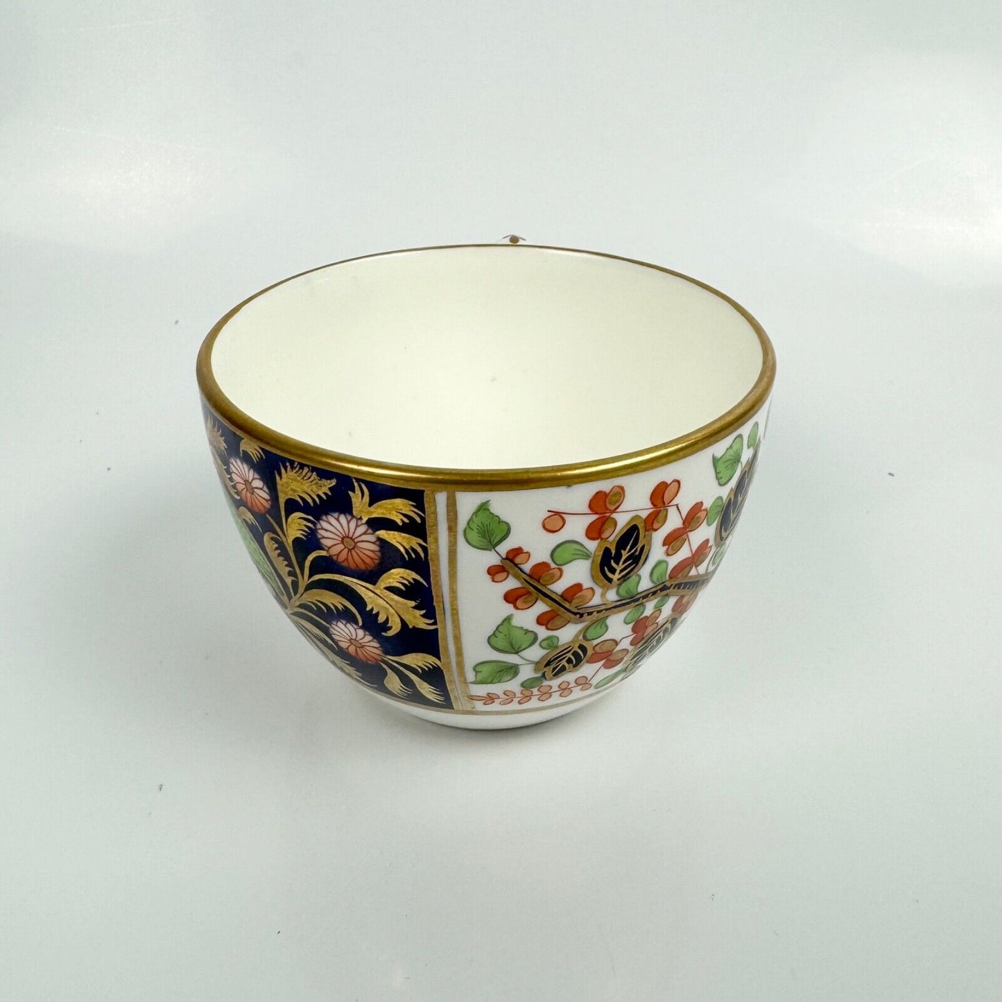 A Spode pattern 1839 teacup, painted in an imari pattern.