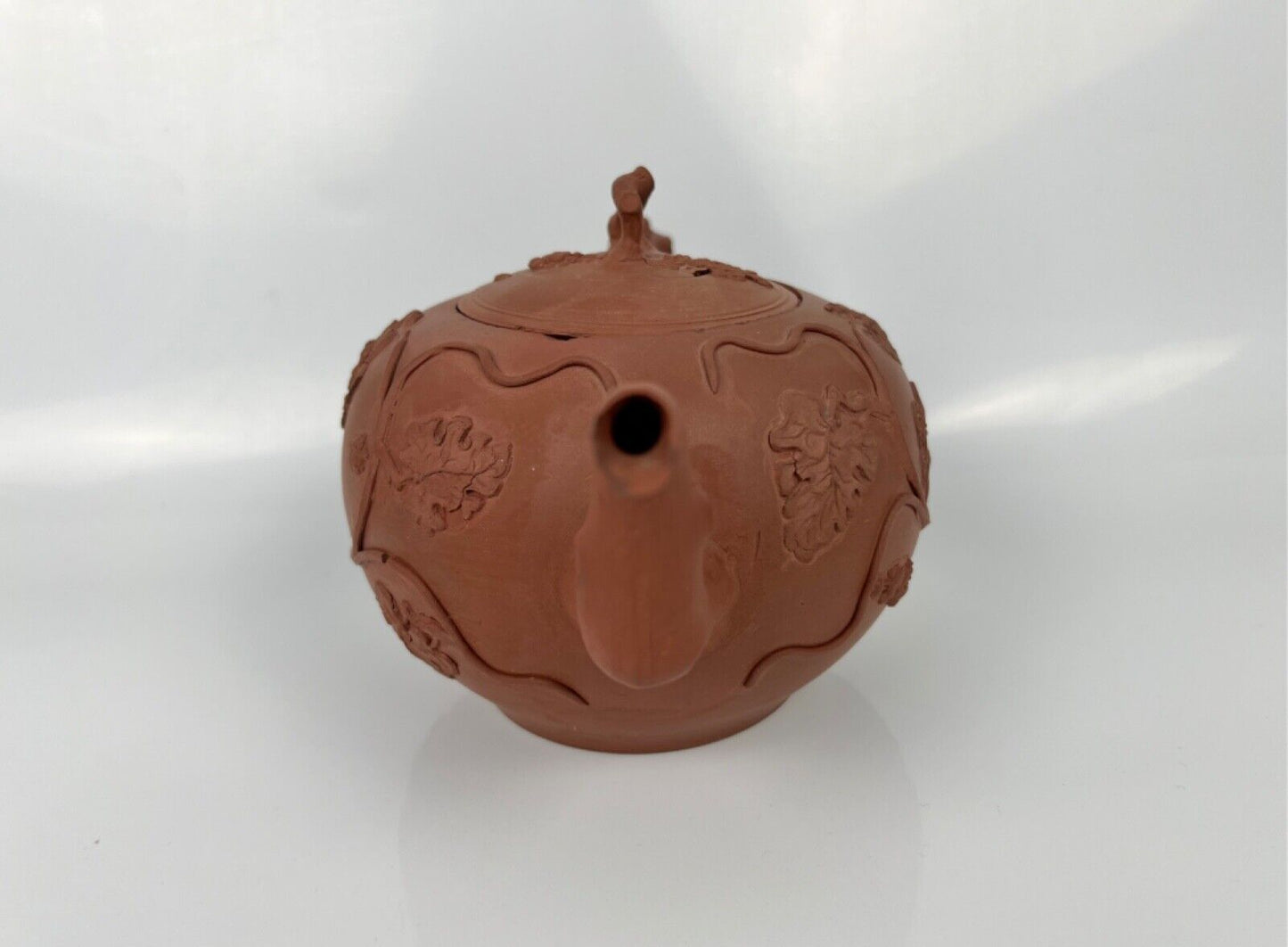 A fine Staffordshire red stoneware teapot with floral sprigged decoration c.1755