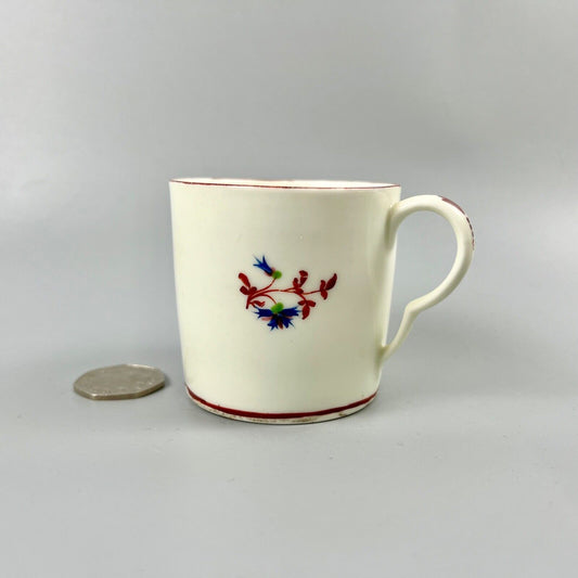 A Pinxton pattern one coffee can painted with Barbeaux Sprigs c1800