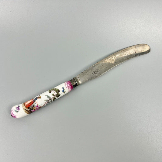 A large German-porcelain-handled steel-bladed dinner knife-the porcelain c.1760.