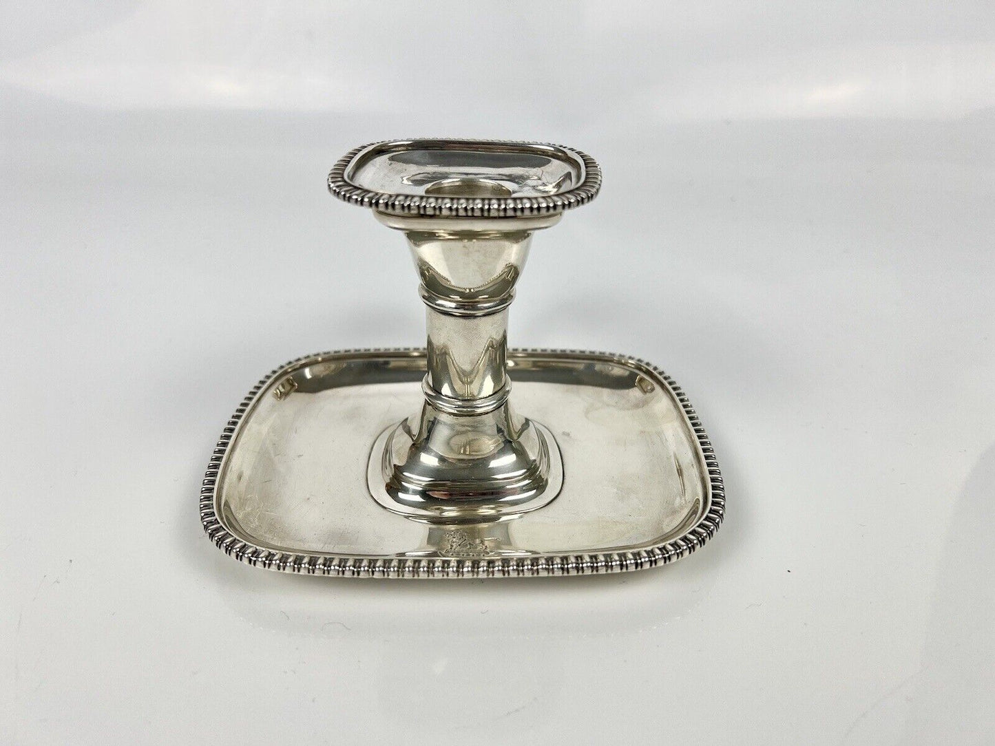 A fine Thomas Bradbury And Son silver chamberstick. London 1913.
