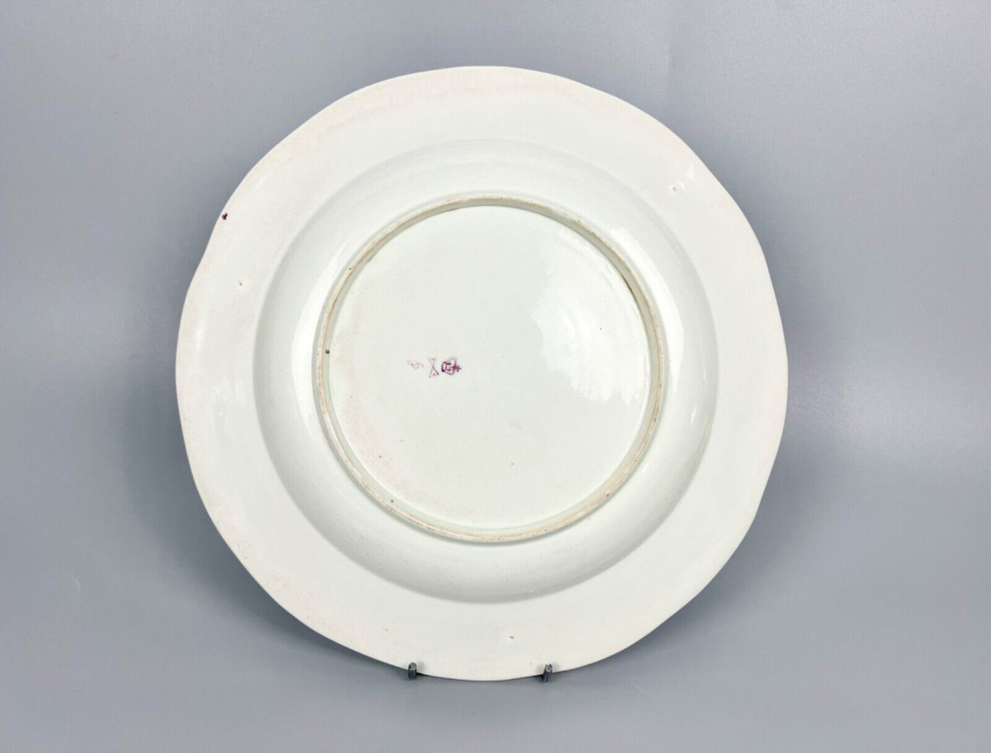 A very rare Derby plate 1785-90 painted as a replacement by William Billingsley