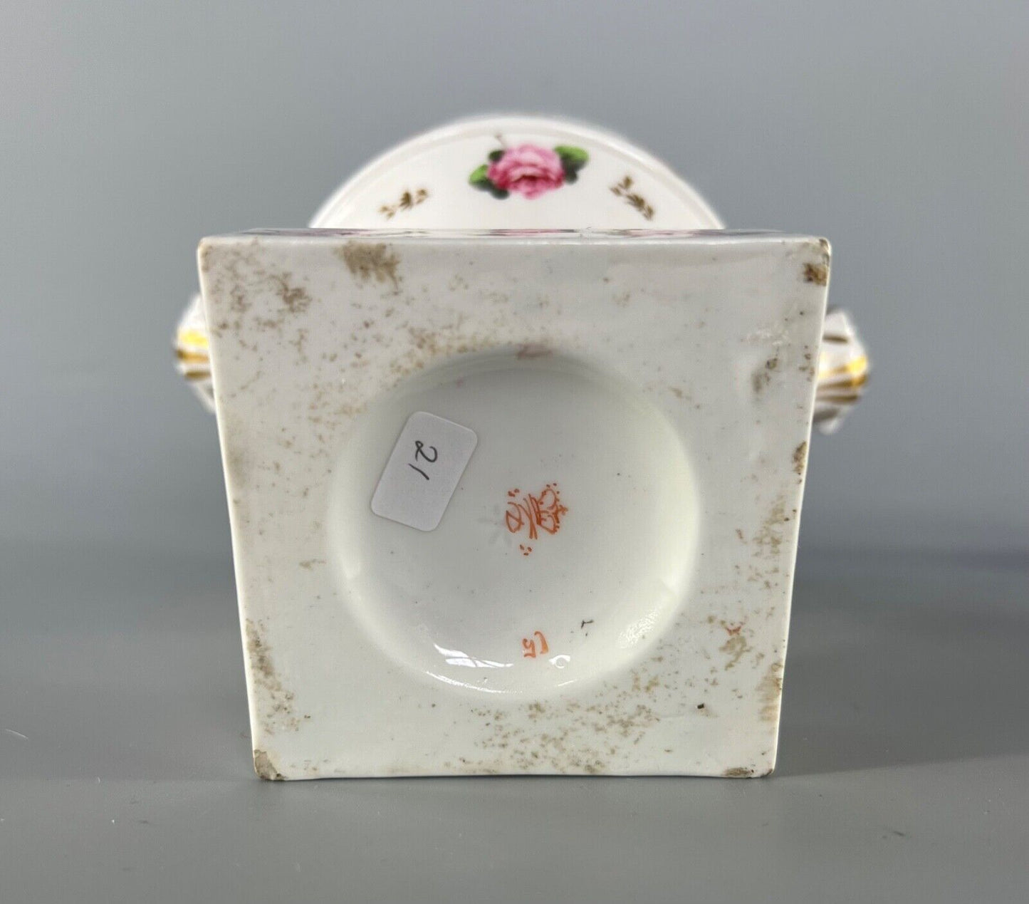 An early 19thc Derby inkstand painted with roses c1810-15. Red mark.