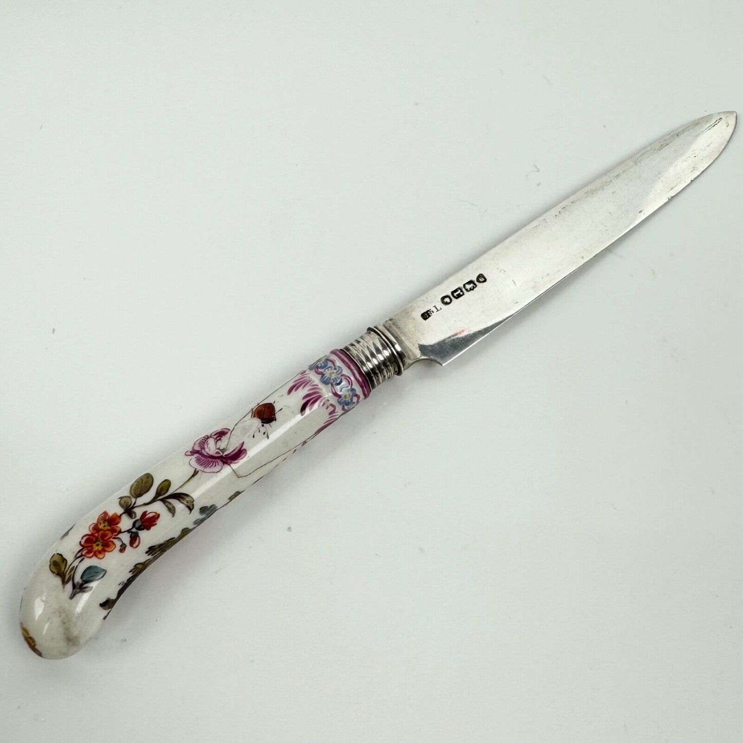 A sterling silver knife fork & spoon set-the silver c.1840, the porcelain c.1760