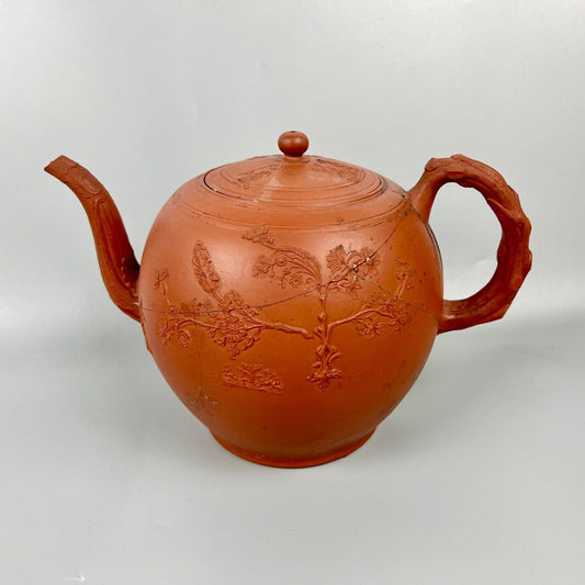 A very large Staffordshire redware punch pot with sprigged decoration c.1760