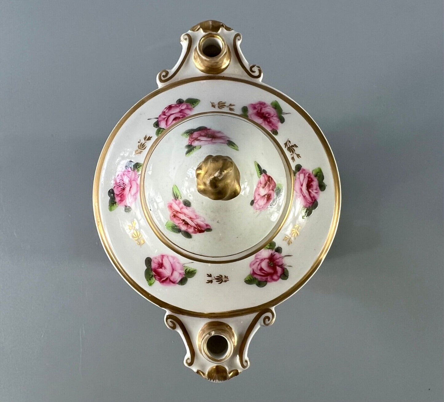 An early 19thc Derby inkstand painted with roses c1810-15. Red mark.