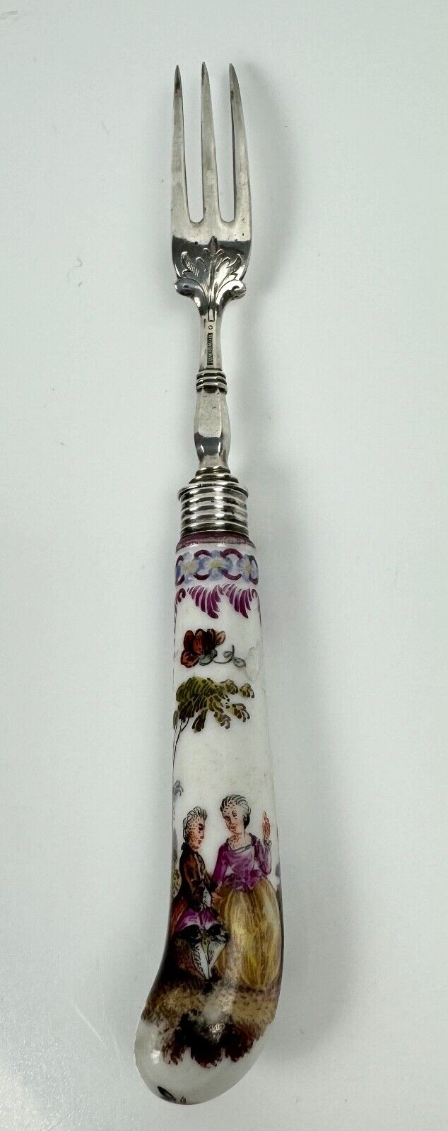 A sterling silver knife fork & spoon set-the silver c.1840, the porcelain c.1760
