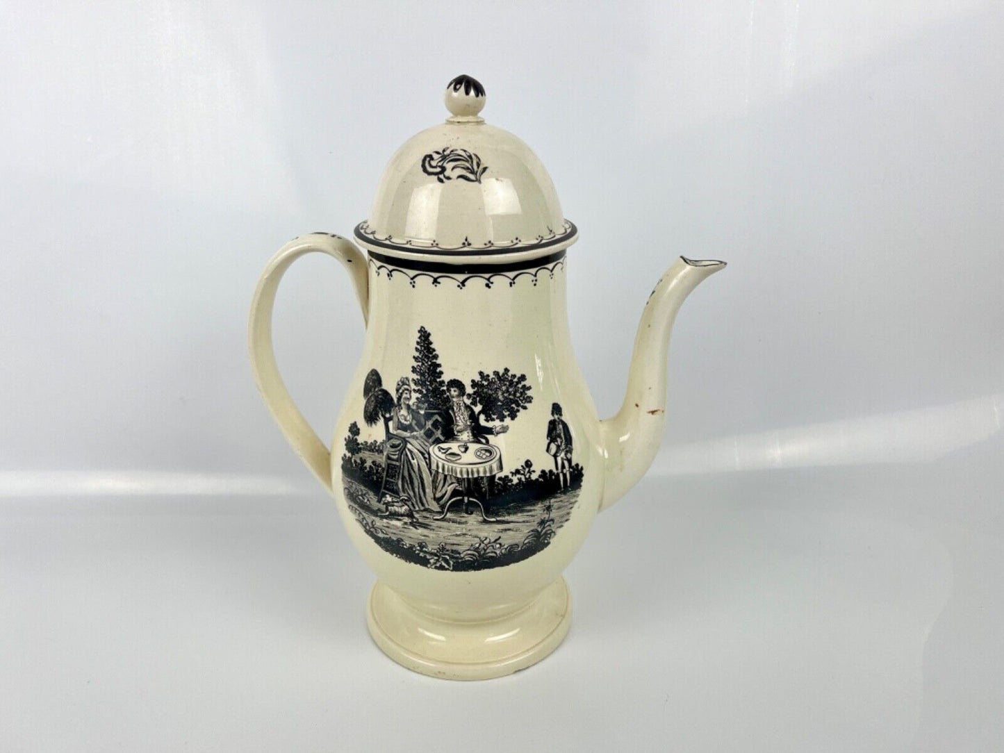 A very tall pearlware "Tea Party" pattern coffee pot c 1790. Prpbably Staffs.