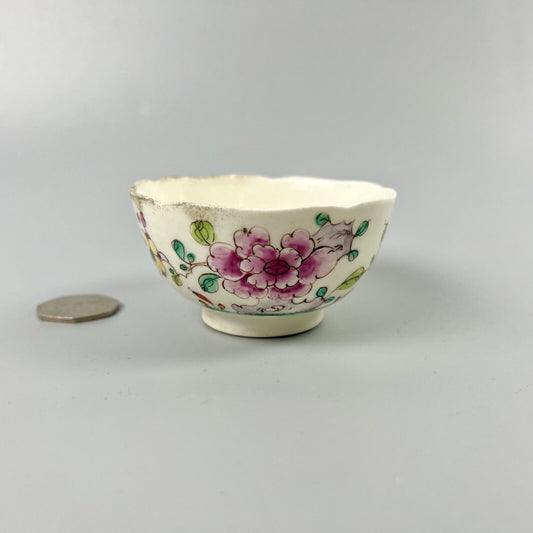 An unusual Bow teabowl painted with famille rose floral sprays c.1750-3