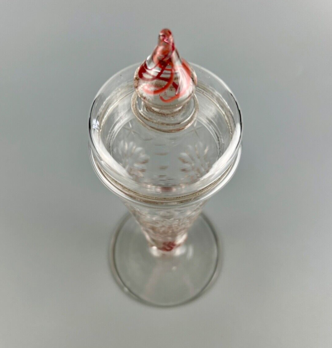 A rare early 18thc. colour twist glass goblet and cover c.1730