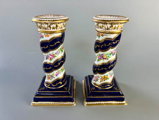 A pair of c 1810-25 Coalport Coalbrookdale spiral-moulded candlesticks.