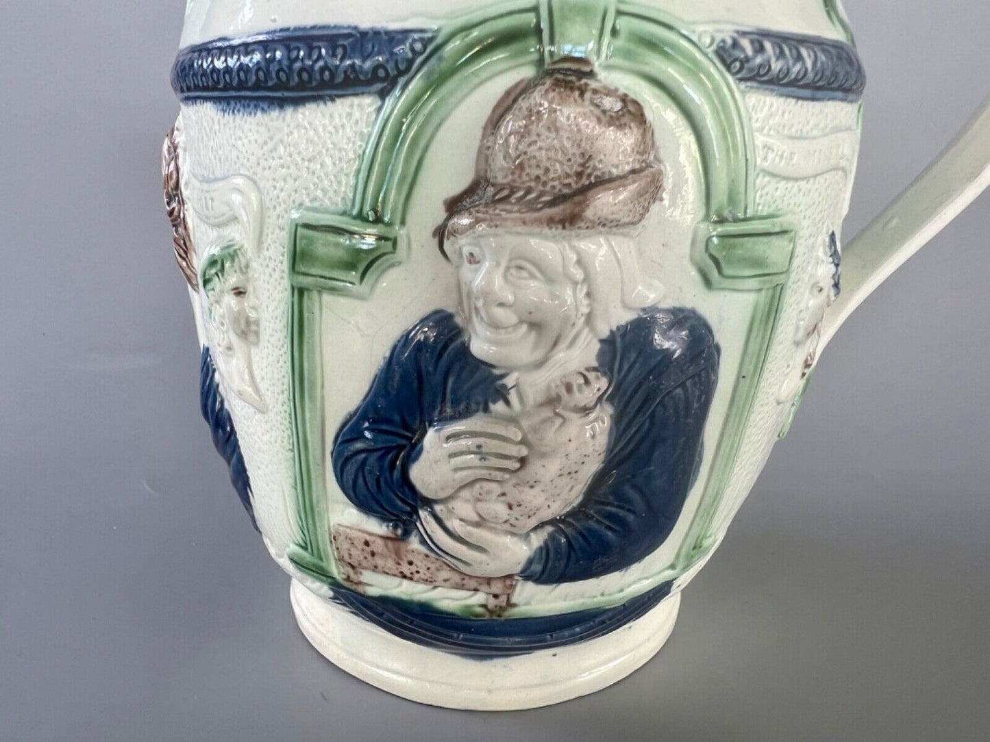A c1790 Shakespear-Miser-Spendthrift jug in high temperature 'Pratt' colours