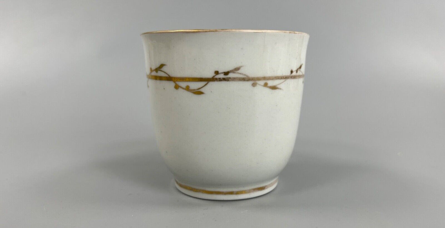 A c.1787-95 New Hall clip handle cup and saucer in pattern number 170