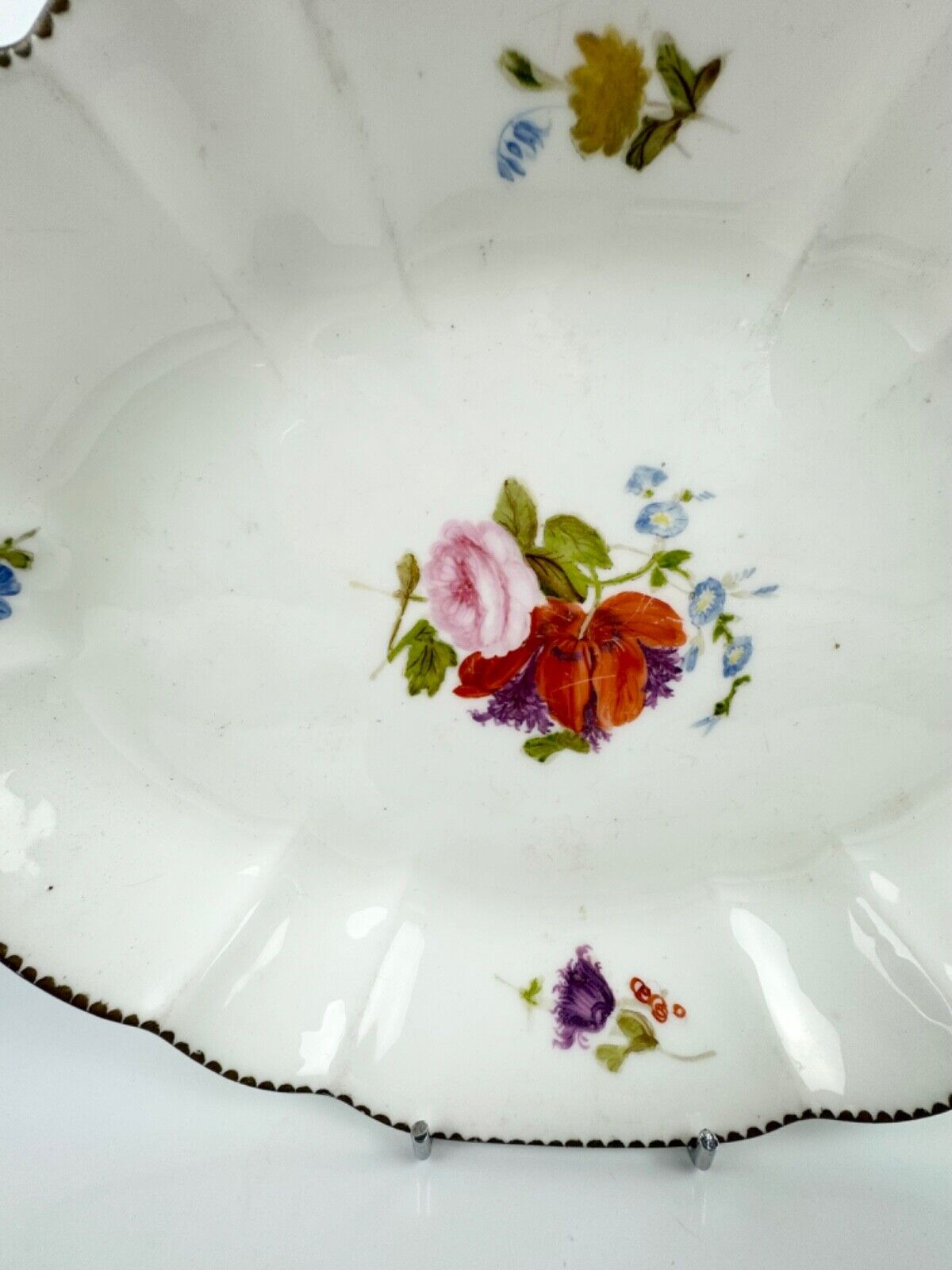 Nantgarw locally decorated lozenge-shaped dish. Impressed "CW" Mark 1810–15