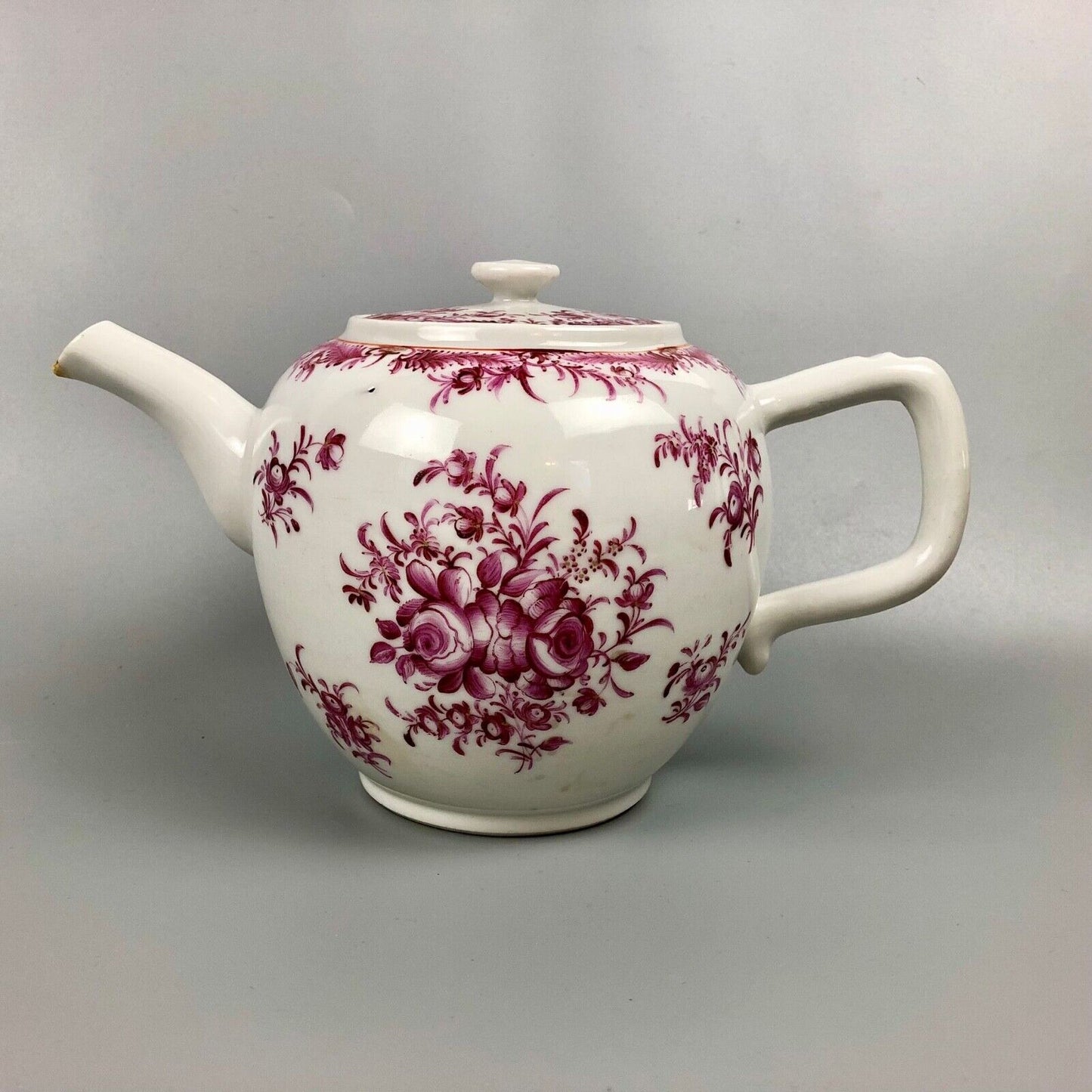 An 18thc Qianlong Period Chinese famille rose teapot painted  with puce flowers