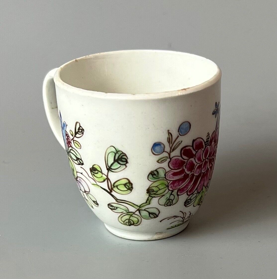 An early Bow coffee cup painted with floral sprays in famille rose stylec.1750-3