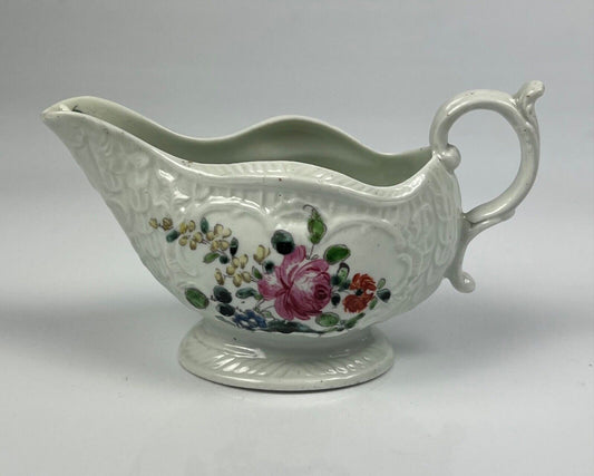 A Philip Christian Liverpool moulded polychrome porcelain sauceboat c.1770