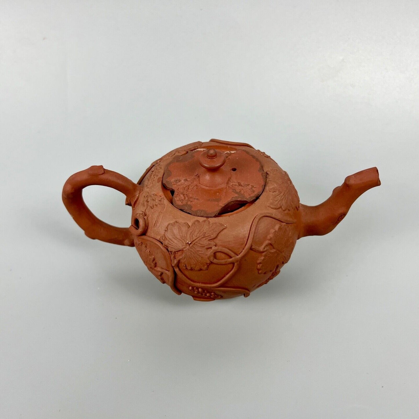 A Diminutive Staffordshire red stoneware teapot with sprigged decoration c.1760