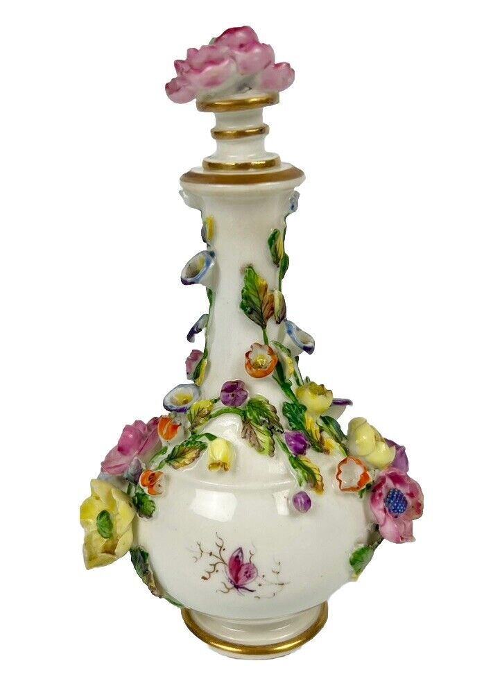 Rockingham porcelain flower encrusted tapered scent bottle. Puce Mark. c.1831-7