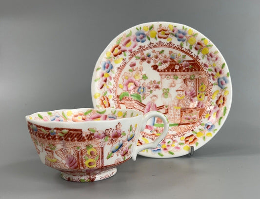An early 19thc New Hall tea cup and saucer in pattern number 3203