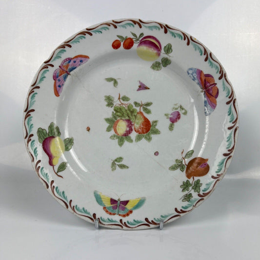 A Derby feather-moulded plate painted with fruit and insects c.1770