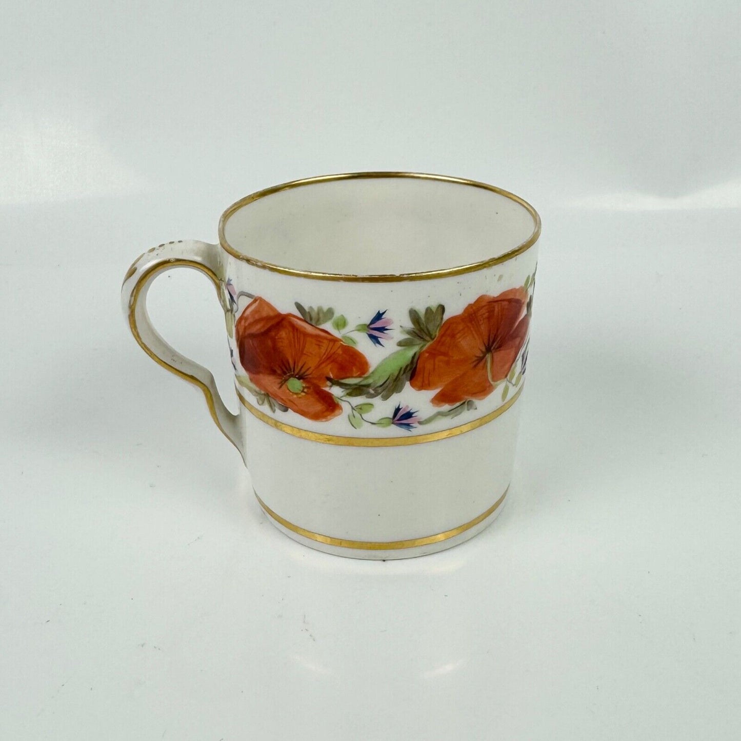 An early 19th century Pinxton coffee can and saucer in pattern 104 circa 1800