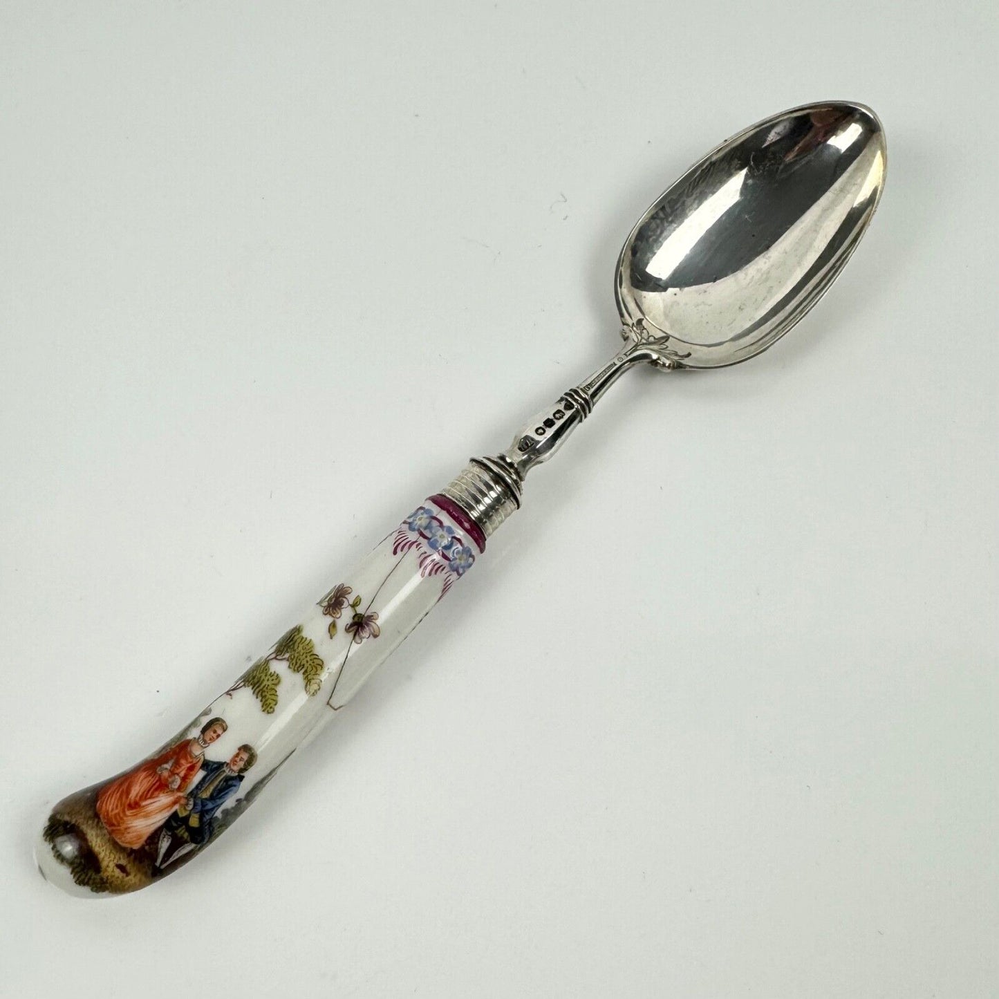 A sterling silver knife fork & spoon set-the silver c.1840, the porcelain c.1760