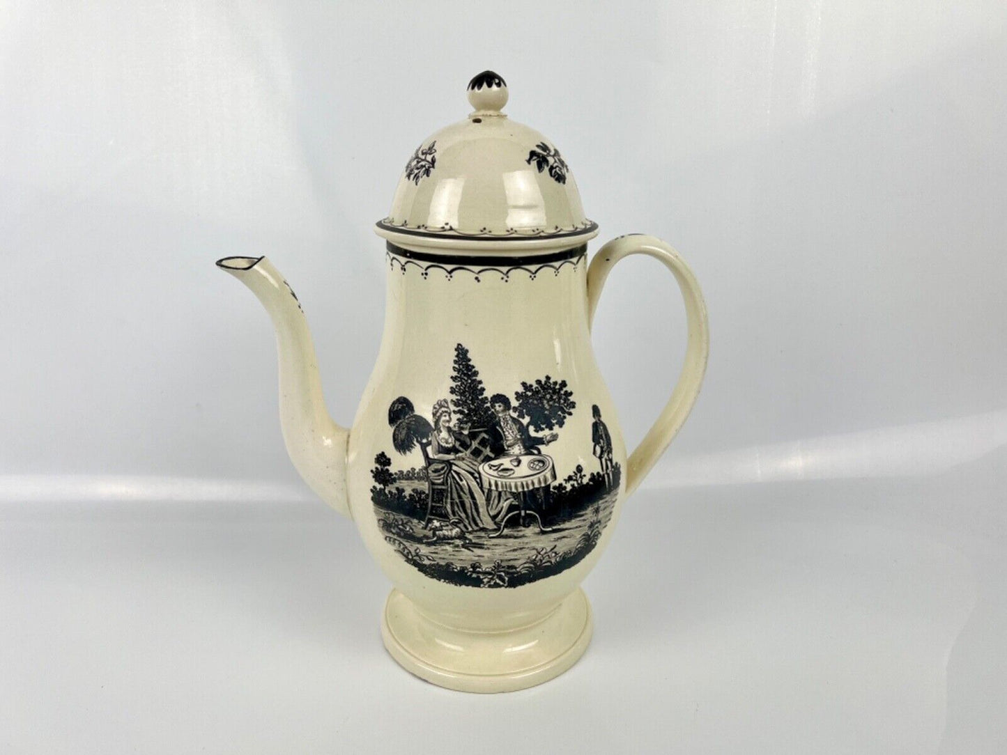 A very tall pearlware "Tea Party" pattern coffee pot c 1790. Prpbably Staffs.