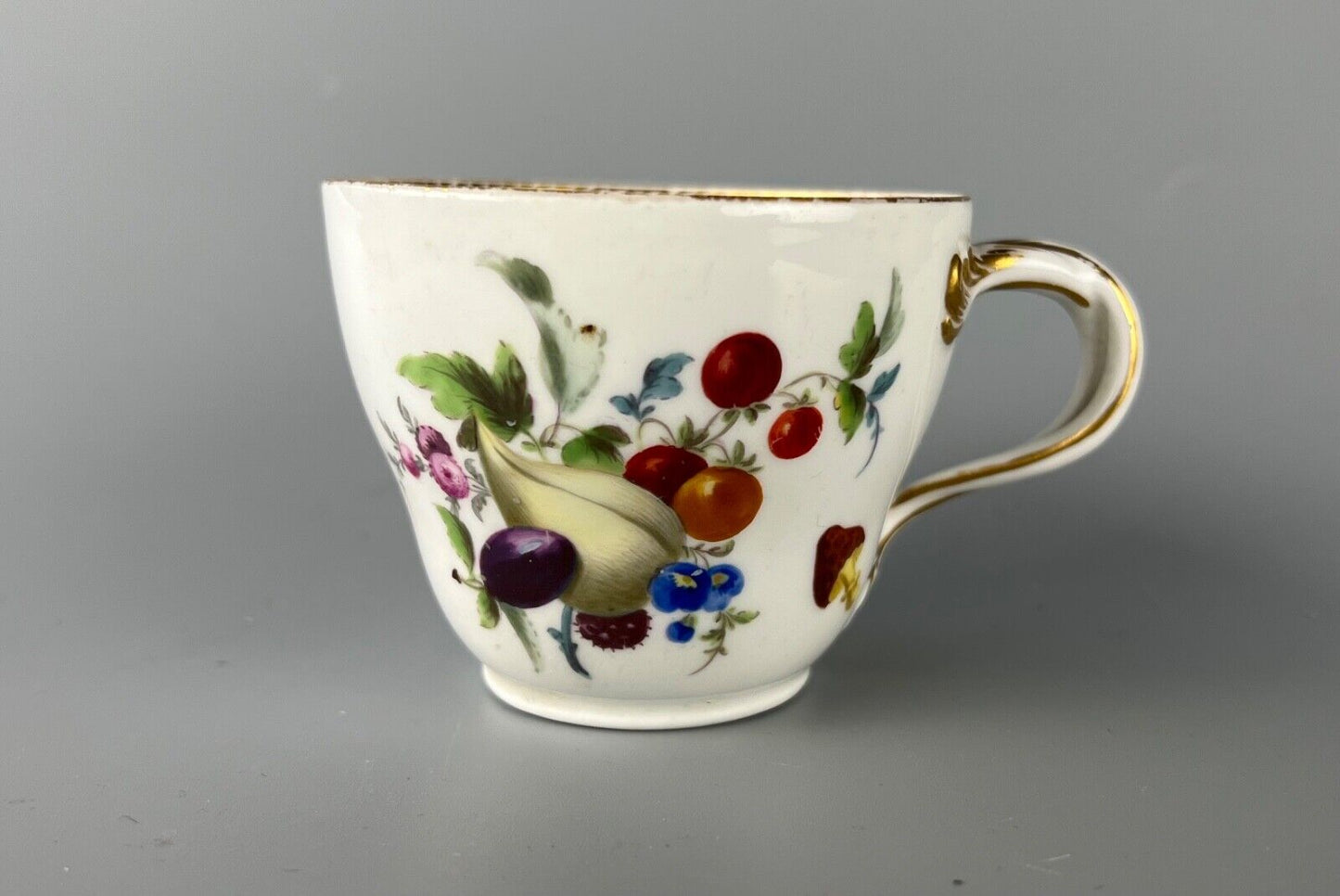 A set of four Meissen Marcolini Period c.1800 bifurcated-handle coffee cups.
