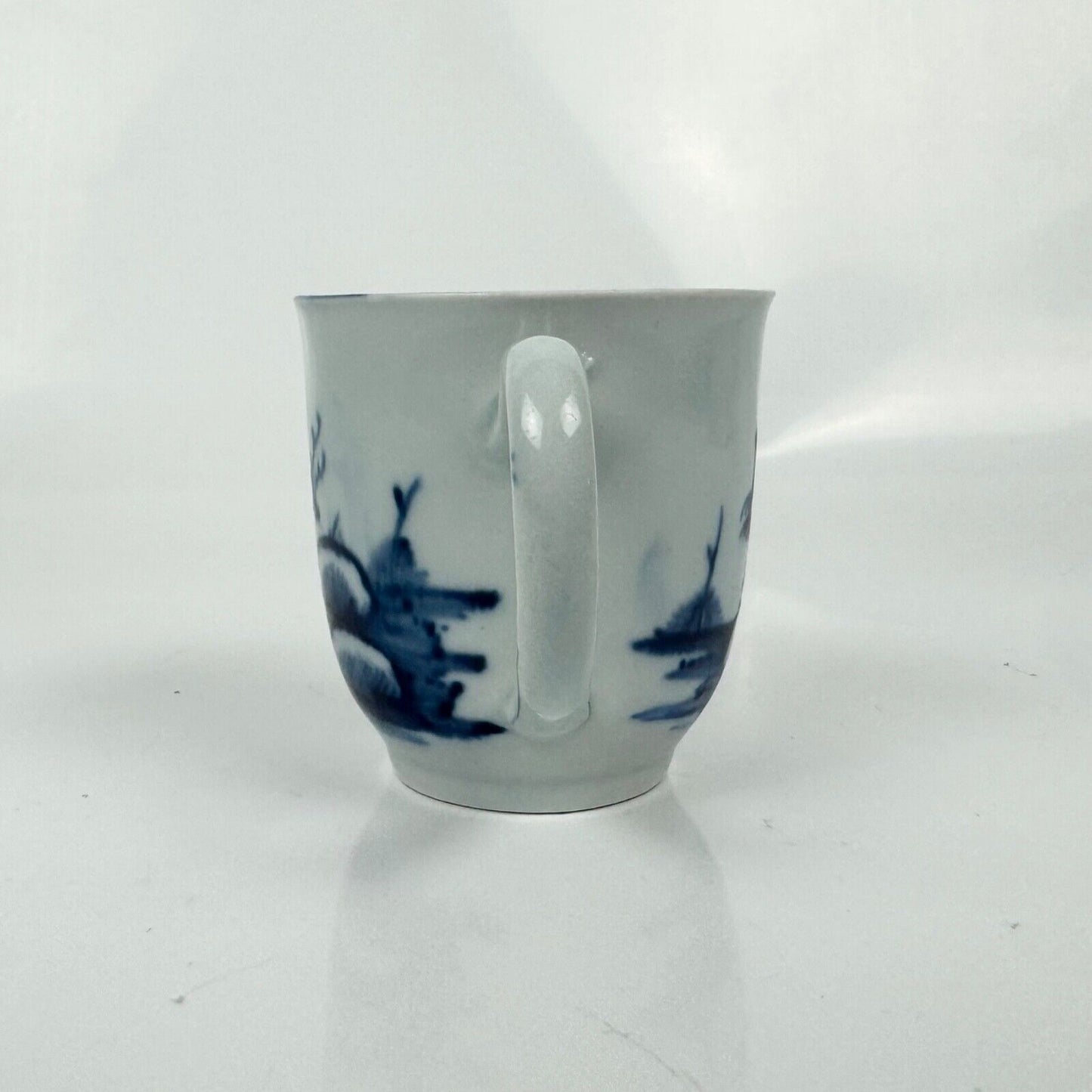 A Liverpool (Chaffers) coffee cup in the "Two Chinamen Bowing" pattern. c.1760-5