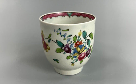 A Seth Pennington Liverpool coffee cup w/painted border & floral decoration