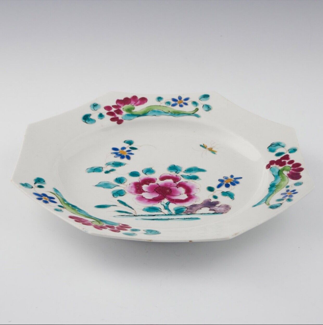 A mid 18thc Bow porcelain octagonal plate in famille rose style c.1752-1755