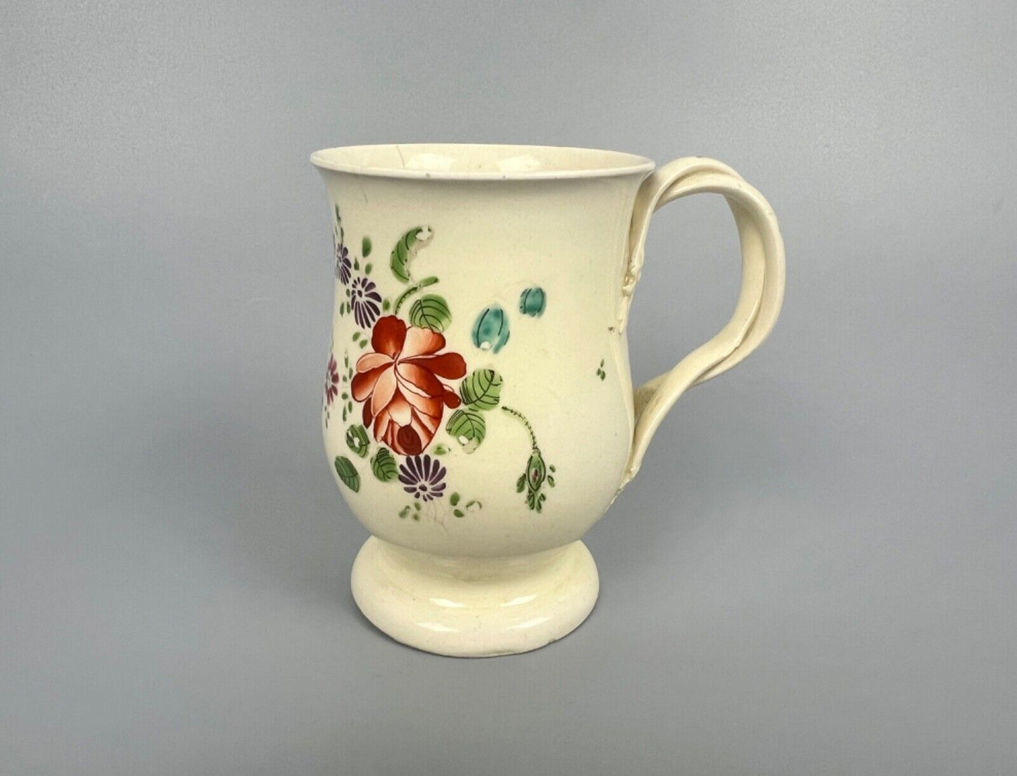 A rare Cockpit Hill Derby floral-painted creamware mug c.1770-5. Ex-Tom Wallford