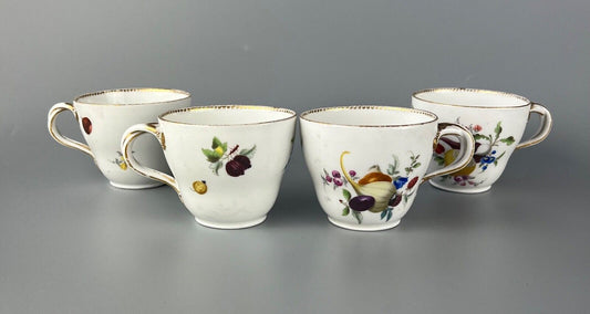 A set of four Meissen Marcolini Period c.1800 bifurcated-handle coffee cups.