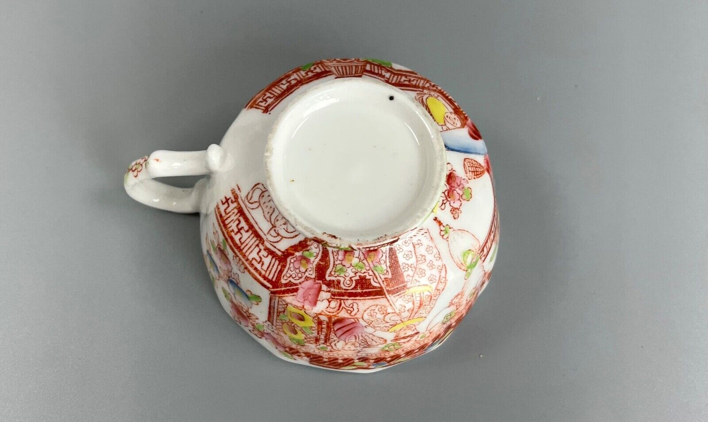 An early 19thc New Hall tea cup and saucer in pattern number 3203