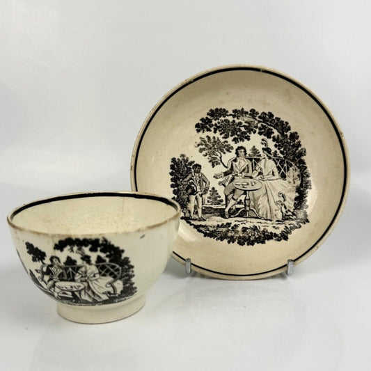 A "tea party" creamware tea bowl and saucer. c.1790.  Probably Staffordshire