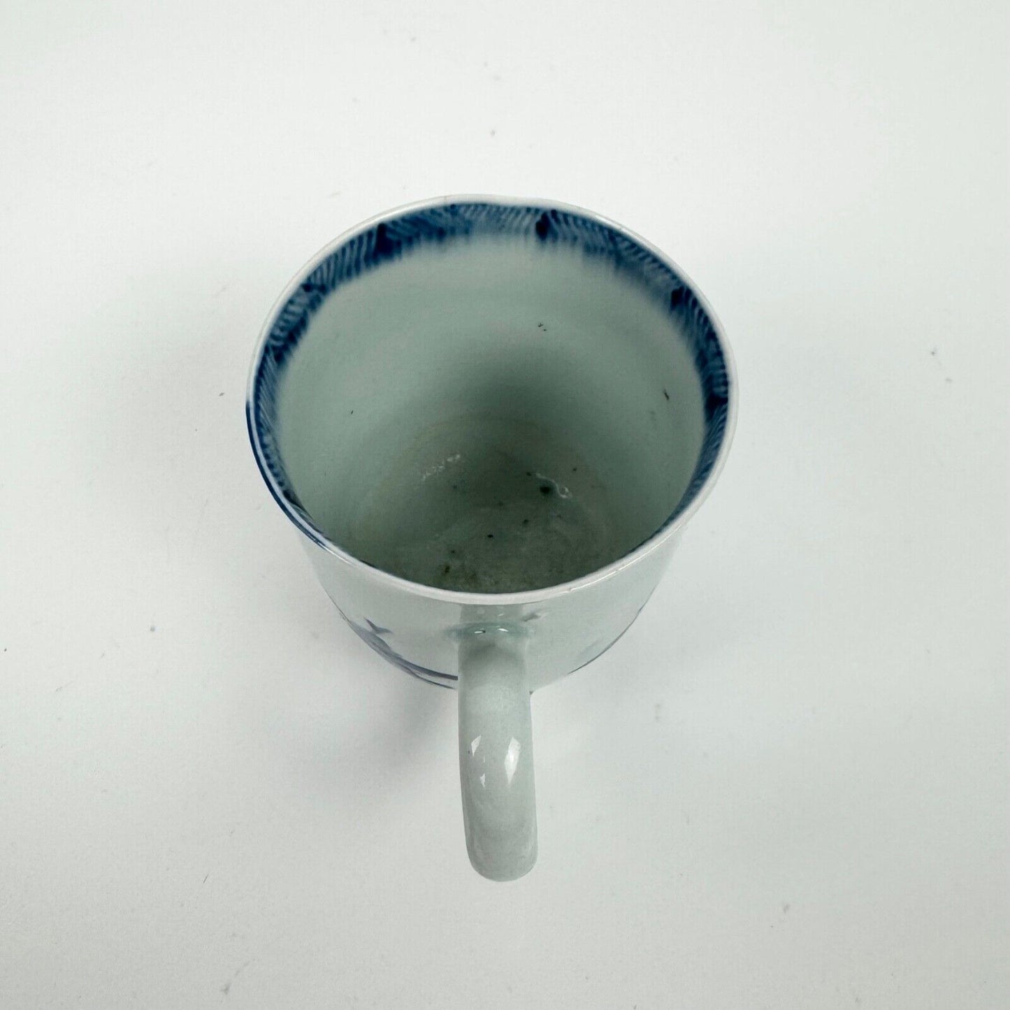 A Liverpool (Chaffers) coffee cup in the "Two Chinamen Bowing" pattern. c.1760-5