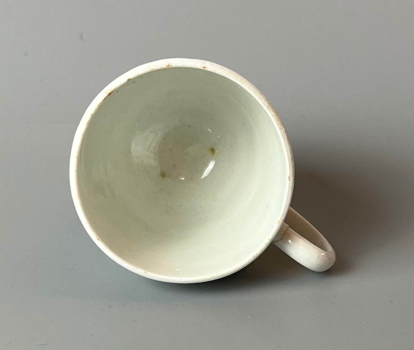 An early Bow coffee cup painted with floral sprays in famille rose stylec.1750-3
