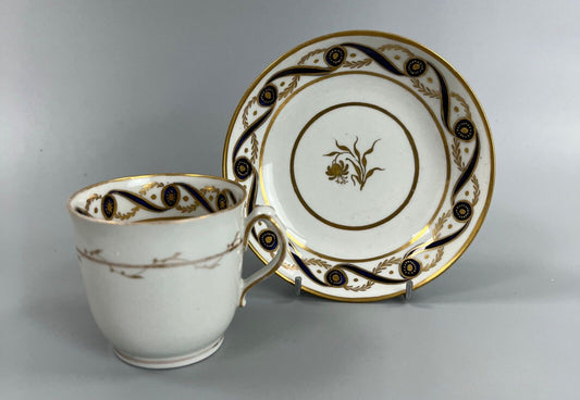 A c.1787-95 New Hall clip handle cup and saucer in pattern number 170