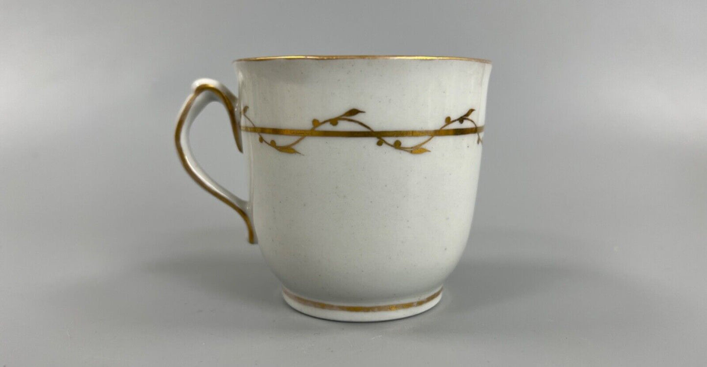 A c.1787-95 New Hall clip handle cup and saucer in pattern number 170