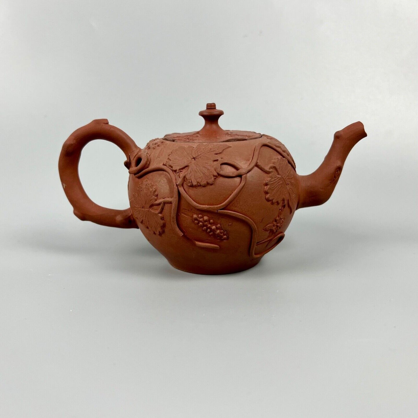 A Diminutive Staffordshire red stoneware teapot with sprigged decoration c.1760